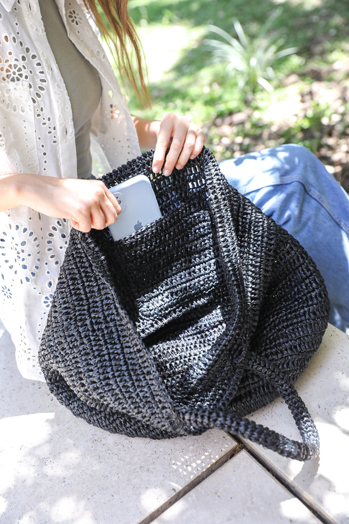 Schwarzes Raffia-Geldbörse