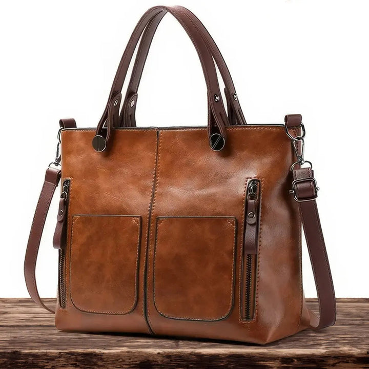 "Ilse's Zeitlose Eleganz | Schultertasche" potrebbe essere riformulato come "Ilse's Klassische Eleganz | Schultertasche".