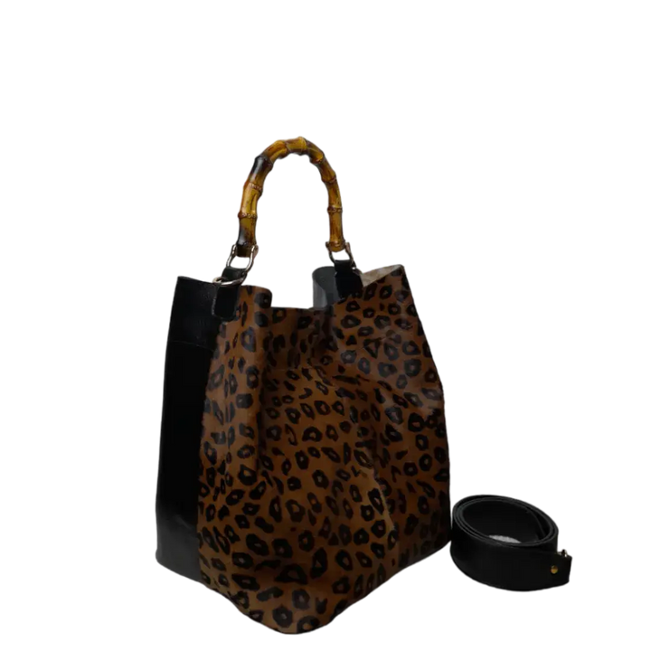 Claire Jaguar und schwarze Ledertasche für Damen