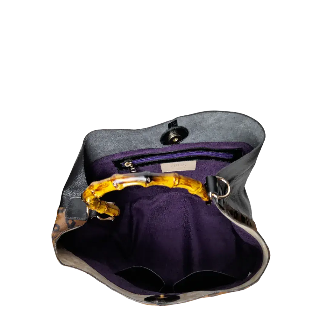 Claire Jaguar und schwarze Ledertasche für Damen