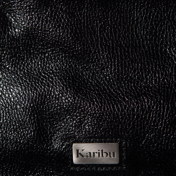Josefa Schwarze Lackleder Geldbörse" can be rewritten as "Josefa Black Patent Leather Wallet.