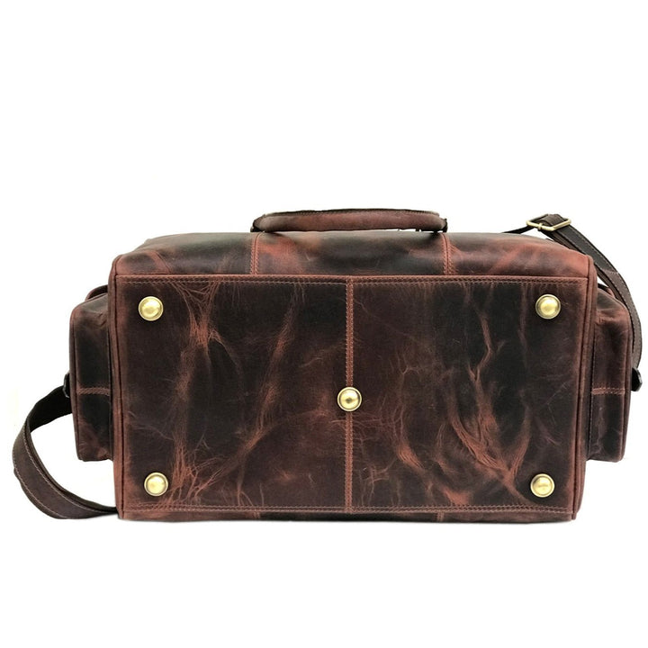 "Zwei Taschen Dunkelbraune Wochenendtasche" could be rewritten as "Dunkelbraune Wochenendtasche von Zwei Taschen".