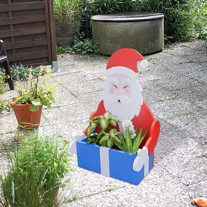 Blumentopf im Weihnachtsmann-Design