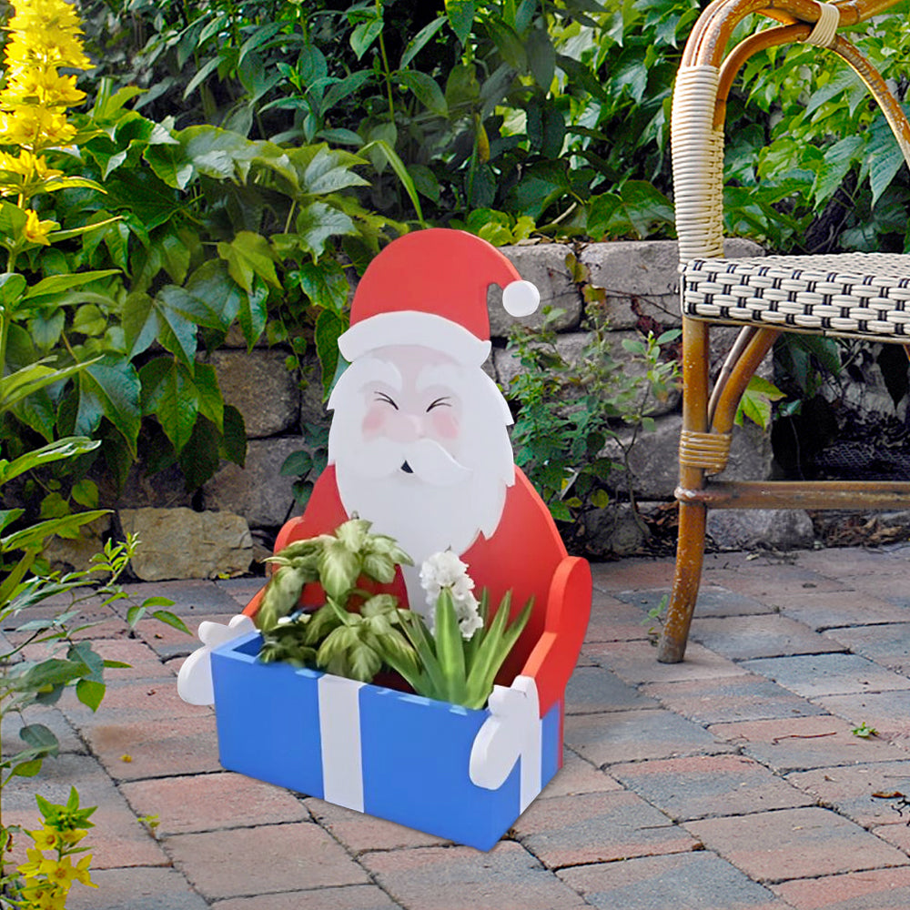 Blumentopf im Weihnachtsmann-Design