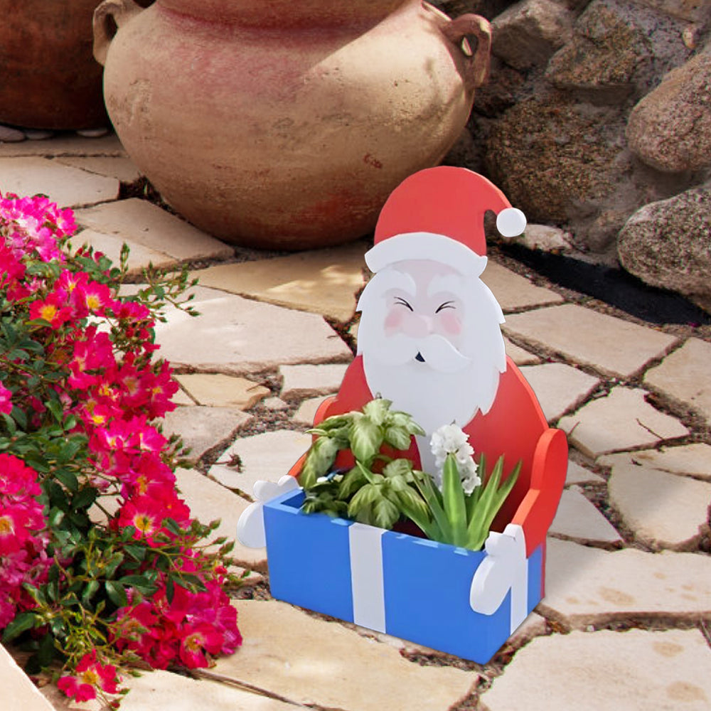 Blumentopf im Weihnachtsmann-Design