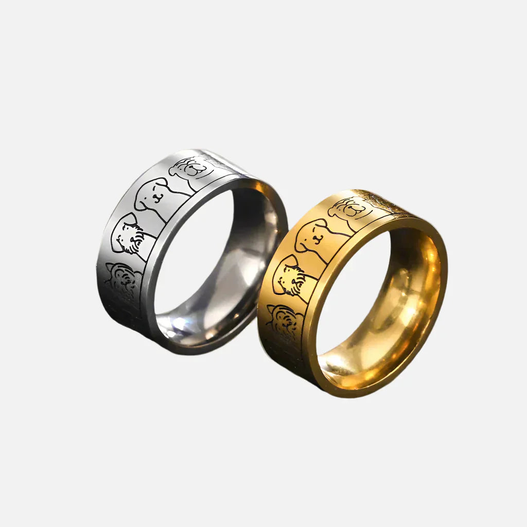 NIKA – Breiter Damenring aus Gold und Silber mit gravierter Pfote