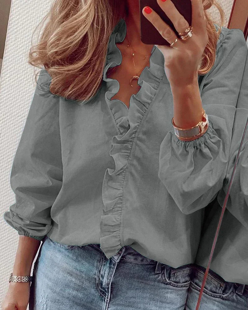 Enola | Elegante Bluse mit verspielten Rüschen