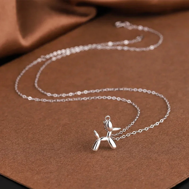 JUNO – Halskette mit Hundeballon-Anhänger in Silber und Gold