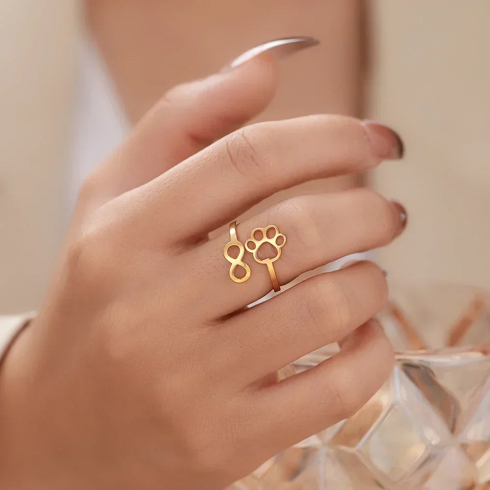 AYLA – Anello Infinity Verstellbarer in argento e oro"

 Riscritto: "AYLA – Anpassbarer Infinity-Pfotenring in argento e oro