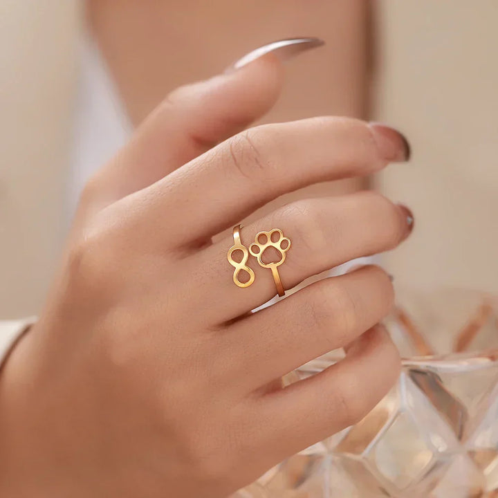 AYLA – Anello Infinity Verstellbarer in argento e oro"

 Riscritto: "AYLA – Anpassbarer Infinity-Pfotenring in argento e oro