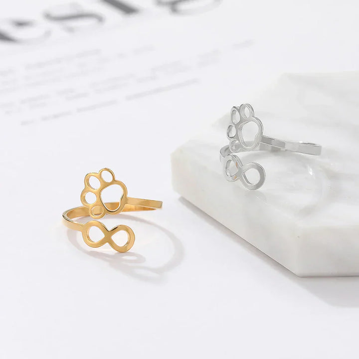 AYLA – Anello Infinity Verstellbarer in argento e oro"

 Riscritto: "AYLA – Anpassbarer Infinity-Pfotenring in argento e oro