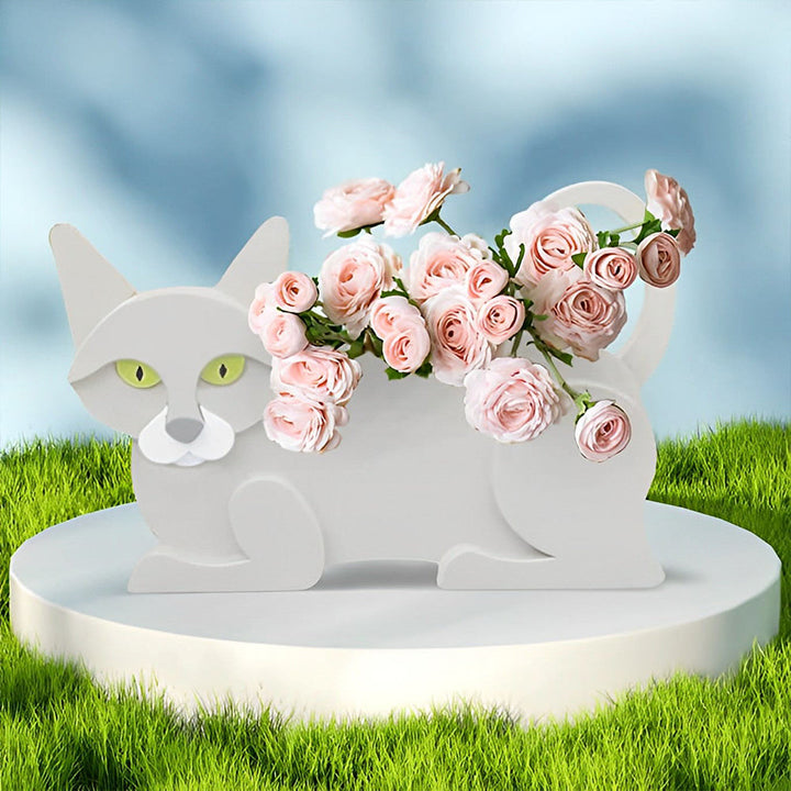 Blumentopf mit weißer Katze