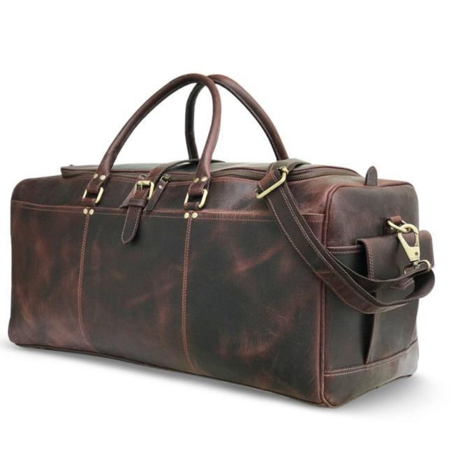 "Dunkelbraune Hunter-Leder-Wochenendtasche" can be rewritten as "Dunkelbraune Hunter-Leder-Wochenend-Tasche".