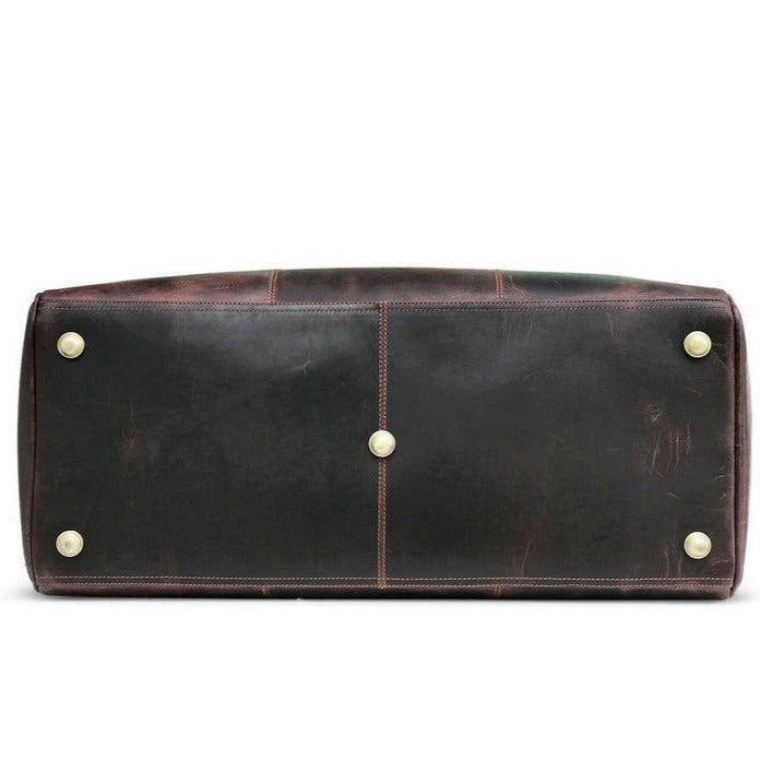 "Dunkelbraune Hunter-Leder-Wochenendtasche" can be rewritten as "Dunkelbraune Hunter-Leder-Wochenend-Tasche".